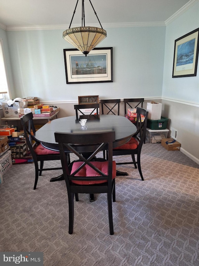 839 Shore Dr, Edgewater, MD 21037 - carpeted dining room featuring ornamental molding