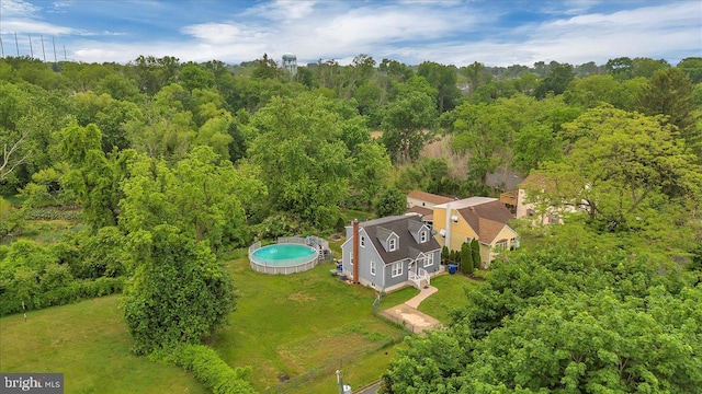 drone / aerial view of a heavily wooded area