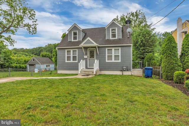 new england style home with a shingled roof