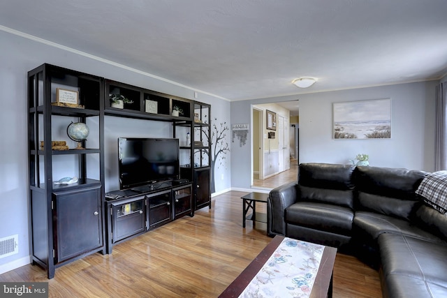 1925 Hopefield Rd, Silver Spring, MD 20905 - living area with light wood finished floors, ornamental molding, and baseboards