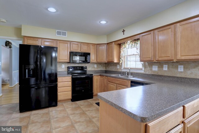 1925 Hopefield Rd, Silver Spring, MD 20905 - kitchen featuring black appliances, a sink, backsplash, dark countertops, and recessed lighting