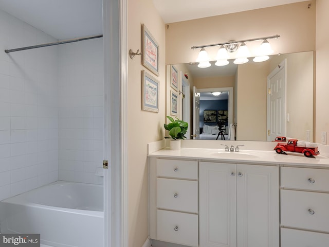 bathroom featuring vanity and shower / tub combination