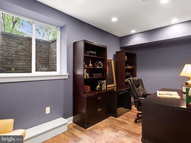 office space with light wood-style flooring and recessed lighting