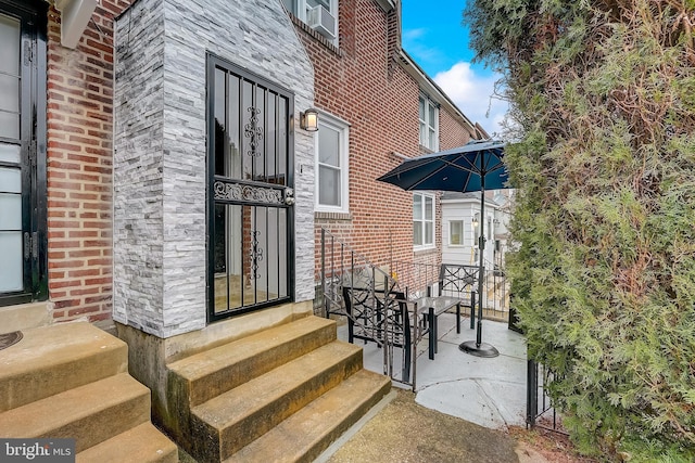 view of patio / terrace featuring entry steps and cooling unit