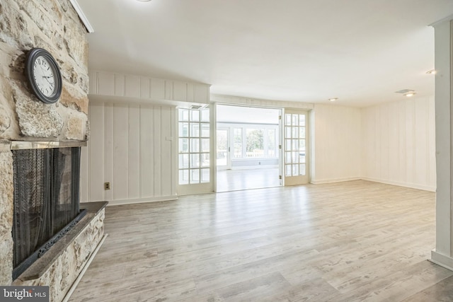 147 Heather Rd, Haddon Township, NJ 08107 - unfurnished living room with a stone fireplace and wood finished floors