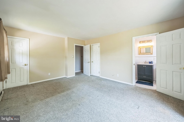 147 Heather Rd, Haddon Township, NJ 08107 - unfurnished bedroom featuring carpet flooring, baseboards, and connected bathroom