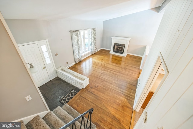 147 Heather Rd, Haddon Township, NJ 08107 - foyer entrance with wood finished floors, a fireplace, stairway, and baseboards