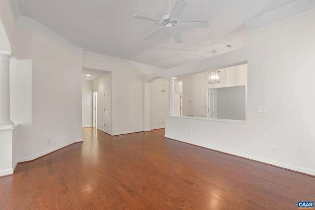 1269 Townbrook Xing, Charlottesville, VA 22901 - unfurnished living room with ornate columns, ceiling fan, ornamental molding, wood finished floors, and baseboards