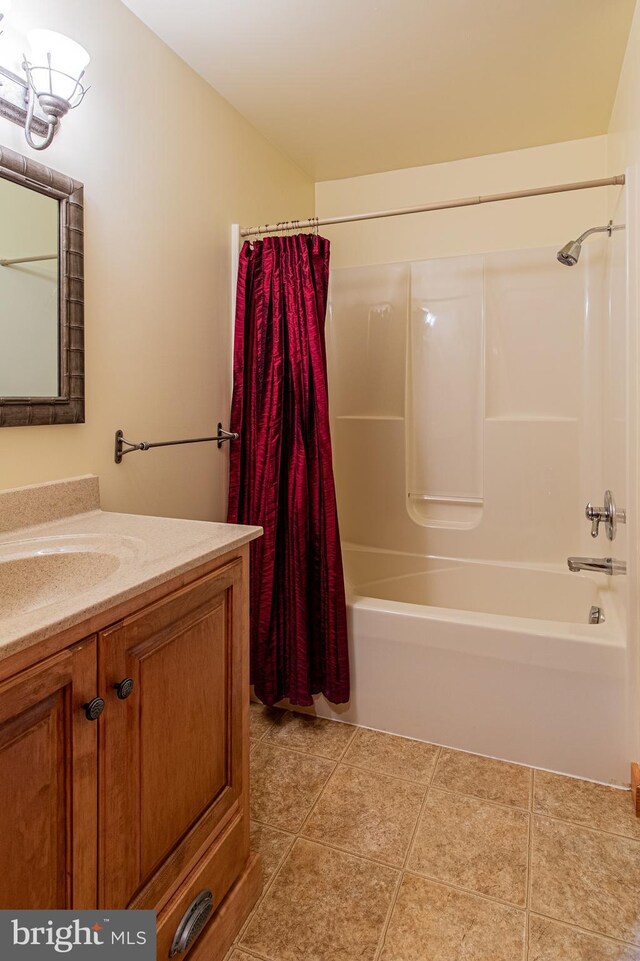 821 Sand Ridge Rd, Howard, PA 16841 - bathroom featuring shower / bath combo, vanity, and tile patterned floors
