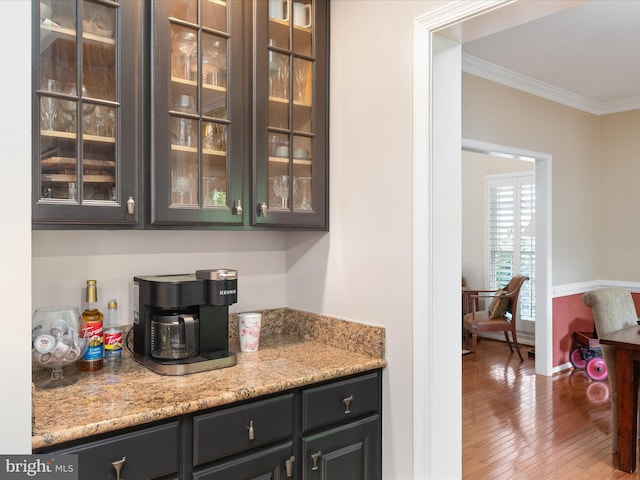 12906 Brafferton Ct, Herndon, VA 20171 - bar area with ornamental molding, hardwood / wood-style floors, and baseboards