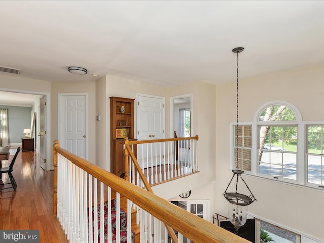 12906 Brafferton Ct, Herndon, VA 20171 - hall with an upstairs landing and wood finished floors