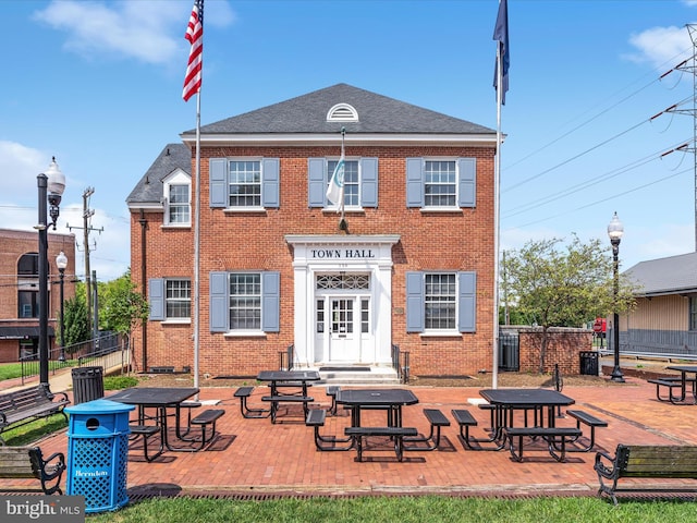 12906 Brafferton Ct, Herndon, VA 20171 - back of property featuring brick siding and a shingled roof