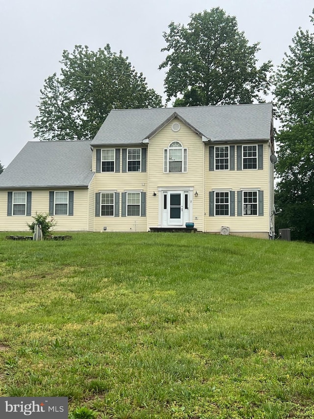 7 Gazelle Pl, New Castle, DE 19720 - colonial inspired home with a front lawn and cooling unit