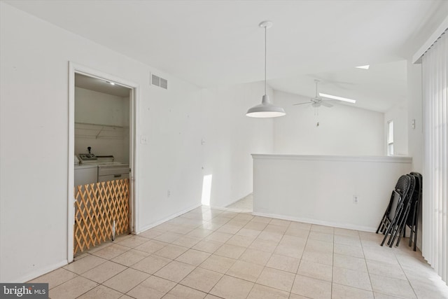 7 Gazelle Pl, New Castle, DE 19720 - unfurnished room featuring washer and dryer, ceiling fan, light tile patterned flooring, and vaulted ceiling