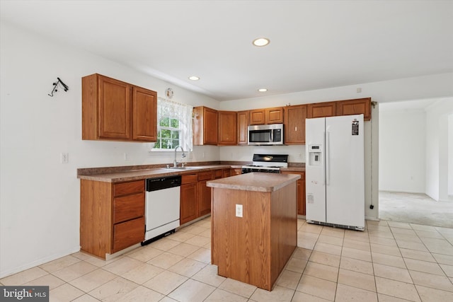 7 Gazelle Pl, New Castle, DE 19720 - kitchen featuring white appliances, a sink, a center island, recessed lighting, and light tile patterned flooring