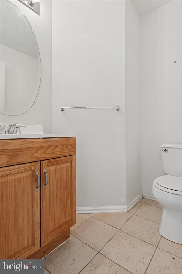 7 Gazelle Pl, New Castle, DE 19720 - bathroom featuring toilet, vanity, tile patterned floors, and baseboards