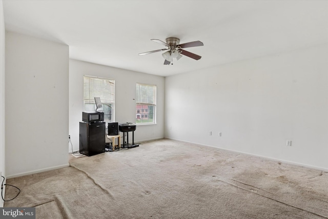 7 Gazelle Pl, New Castle, DE 19720 - carpeted living area featuring a ceiling fan and baseboards