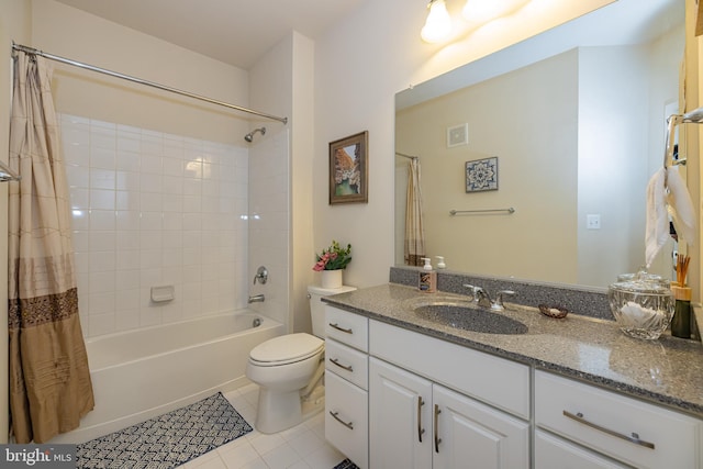 bathroom with tile patterned flooring, shower / tub combo, toilet, and vanity