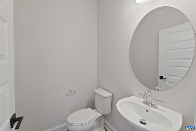 2 Talen Ln, Charlottesville, VA 22911 - half bathroom with a sink, baseboards, and toilet