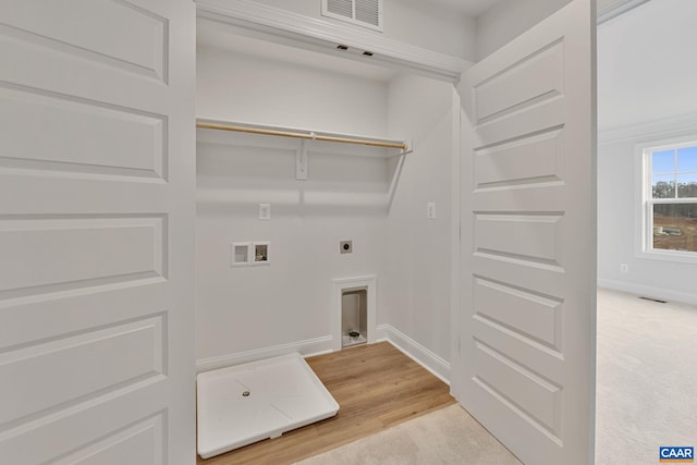 2 Talen Ln, Charlottesville, VA 22911 - laundry area featuring hookup for an electric dryer, hookup for a washing machine, baseboards, and light colored carpet