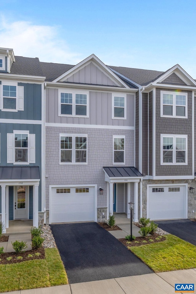 2 Talen Ln, Charlottesville, VA 22911 - townhome / multi-family property with board and batten siding, driveway, stone siding, and a garage