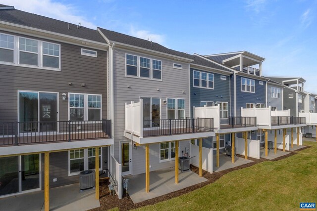 2 Talen Ln, Charlottesville, VA 22911 - back of property with central AC unit, a patio area, a residential view, and a yard