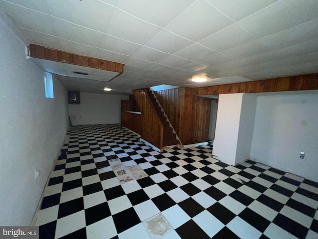 3208 28th Pkwy, Temple Hills, MD 20748 - finished below grade area with light flooring, stairs, and wooden walls