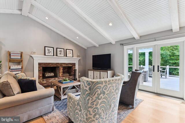 11476 Bronzedale Dr, Oakton, VA 22124 - living area featuring light wood-style floors, a fireplace, and recessed lighting