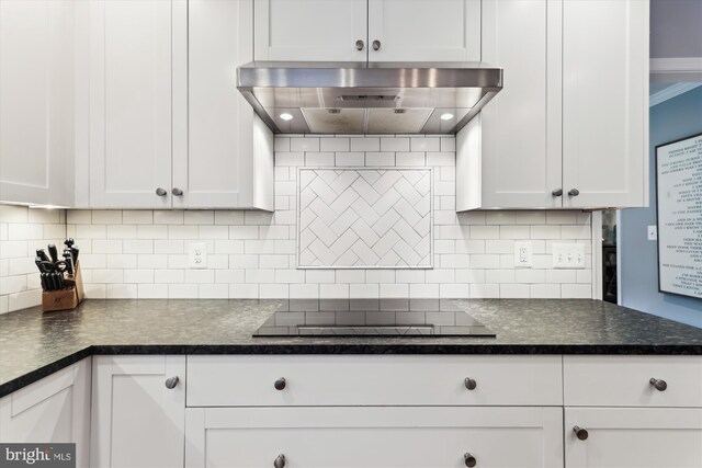 11476 Bronzedale Dr, Oakton, VA 22124 - kitchen featuring wall chimney range hood, white cabinetry, and backsplash