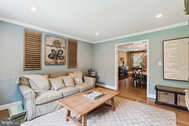 11476 Bronzedale Dr, Oakton, VA 22124 - living area with baseboards, ornamental molding, light wood-style flooring, recessed lighting, and a chandelier