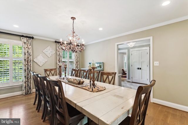 11476 Bronzedale Dr, Oakton, VA 22124 - dining area featuring a chandelier, light wood-type flooring, baseboards, recessed lighting, and crown molding