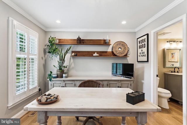 11476 Bronzedale Dr, Oakton, VA 22124 - home office with light wood-style flooring, ornamental molding, a sink, and recessed lighting