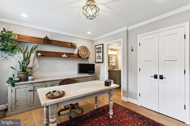 11476 Bronzedale Dr, Oakton, VA 22124 - home office with ornamental molding, light wood-type flooring, recessed lighting, baseboards, and a sink