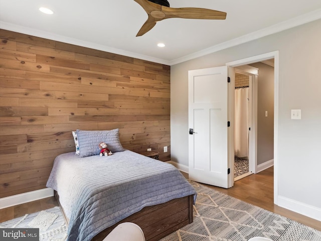 11476 Bronzedale Dr, Oakton, VA 22124 - bedroom featuring baseboards, ornamental molding, wooden walls, recessed lighting, and wood finished floors