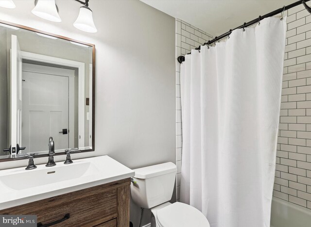 11476 Bronzedale Dr, Oakton, VA 22124 - bathroom featuring toilet, vanity, and shower / tub combo
