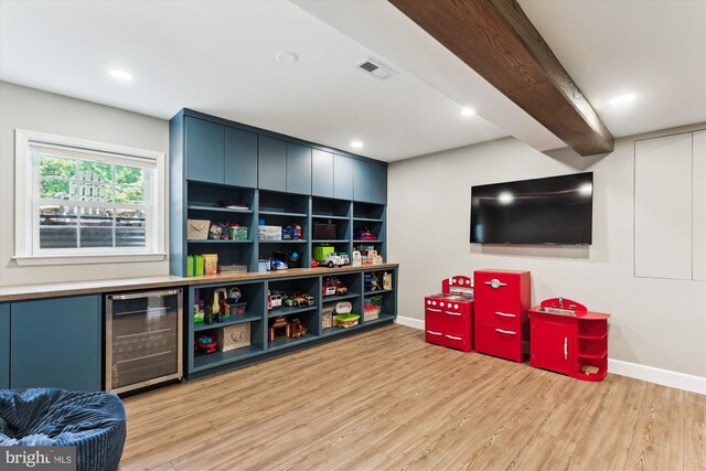 11476 Bronzedale Dr, Oakton, VA 22124 - recreation room with beverage cooler, light wood-style flooring, baseboards, and recessed lighting