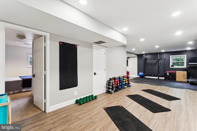 11476 Bronzedale Dr, Oakton, VA 22124 - workout room featuring wood finished floors, baseboards, and recessed lighting