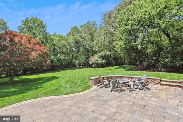 11476 Bronzedale Dr, Oakton, VA 22124 - view of patio / terrace with an outdoor fire pit