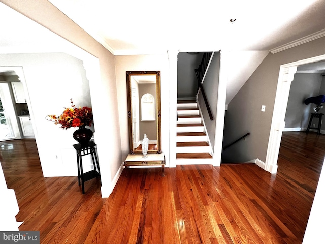 6572 Flagmaker Ct, Falls Church, VA 22042 - foyer with wood finished floors, ornamental molding, baseboards, and stairs