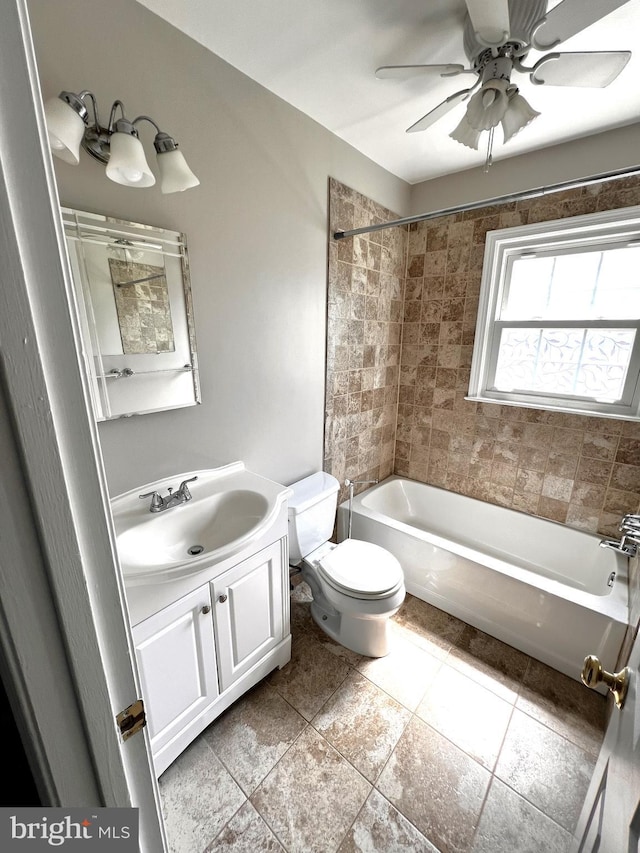 6572 Flagmaker Ct, Falls Church, VA 22042 - full bath featuring toilet, ceiling fan, vanity, shower / bathtub combination, and tile patterned floors