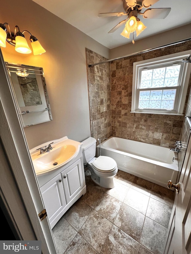 6572 Flagmaker Ct, Falls Church, VA 22042 - full bath with toilet, vanity, tile patterned flooring, a ceiling fan, and bathtub / shower combination