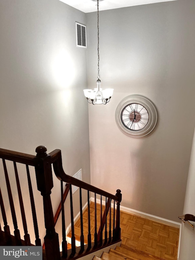 6572 Flagmaker Ct, Falls Church, VA 22042 - stairs with baseboards and a chandelier