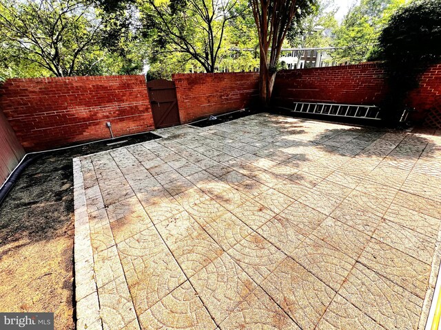 6572 Flagmaker Ct, Falls Church, VA 22042 - view of patio featuring a gate