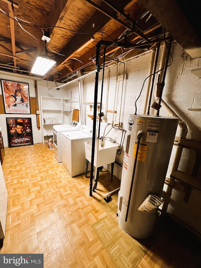 6572 Flagmaker Ct, Falls Church, VA 22042 - unfinished basement featuring washer and clothes dryer, water heater, and a sink