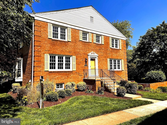 6572 Flagmaker Ct, Falls Church, VA 22042 - view of front of property featuring a front lawn and brick siding