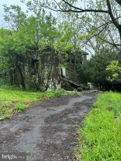 view of asphalt driveway