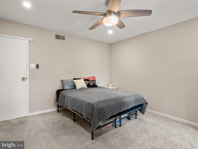 carpeted bedroom with a ceiling fan, baseboards, and recessed lighting