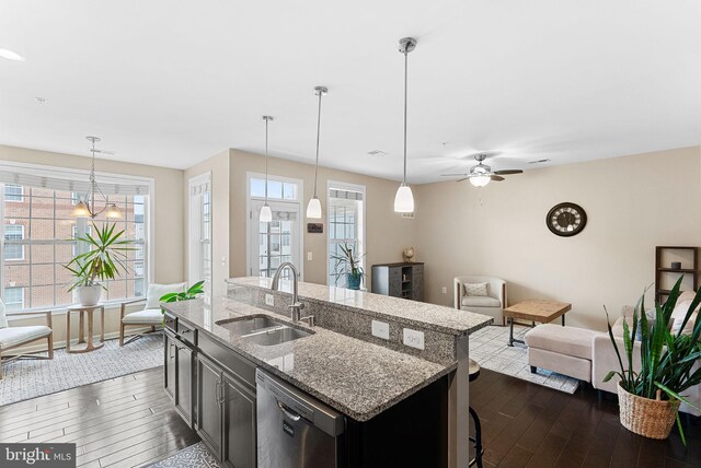 23483 Aldie Manor Ter, Ashburn, VA 20148 - kitchen with a sink, stainless steel dishwasher, dark wood-style floors, a center island with sink, and open floor plan