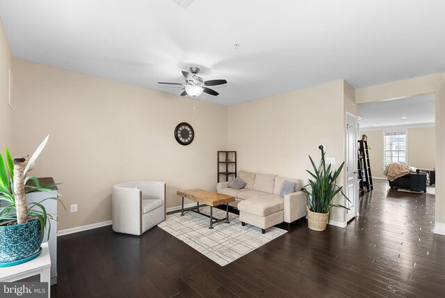 23483 Aldie Manor Ter, Ashburn, VA 20148 - living area featuring wood finished floors, ceiling fan, and baseboards