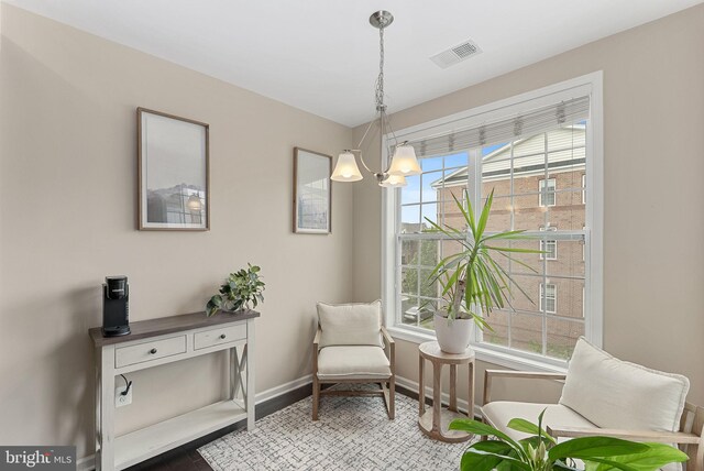 23483 Aldie Manor Ter, Ashburn, VA 20148 - sitting room featuring baseboards and a chandelier